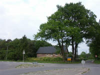 Ecke Alter Postweg/Schleitkamp mit den wiederaufgebaute Bauernhaus Heimath
